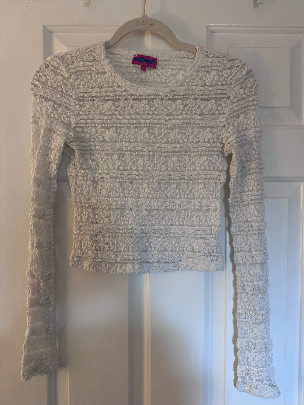 White lace long sleeve top from  Edikted
